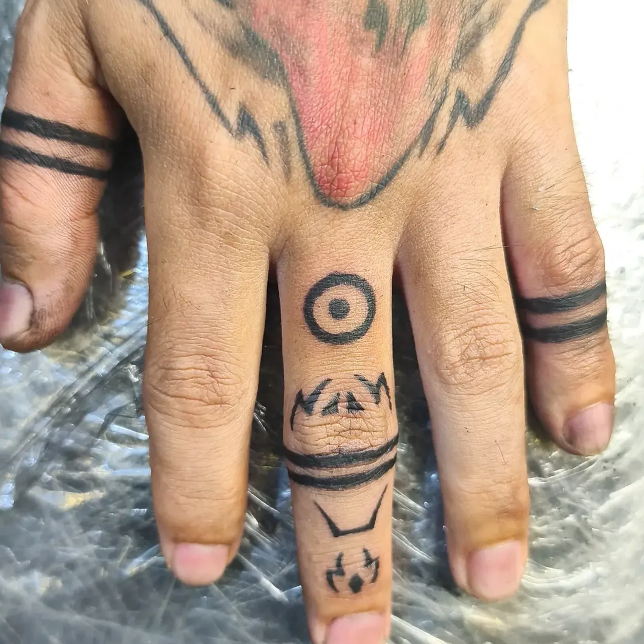 simple finger tattoos on hand