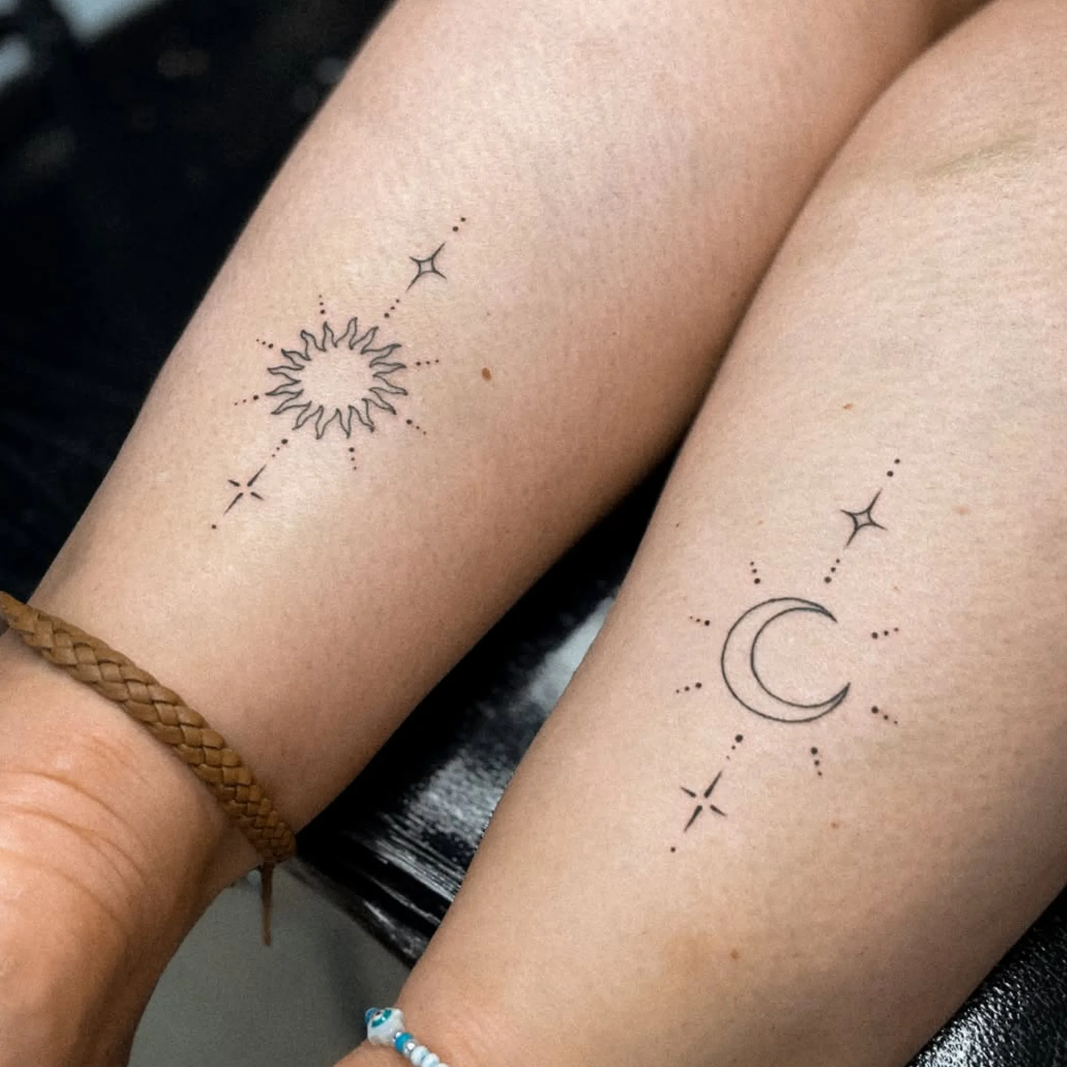 simple black line tattoos on skin